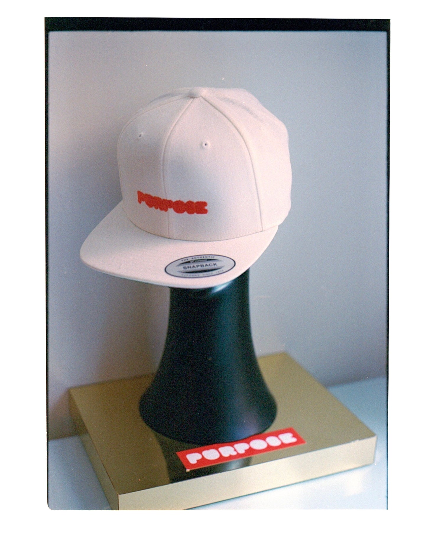 PURPOSE.WHITE SNAPBACK HAT